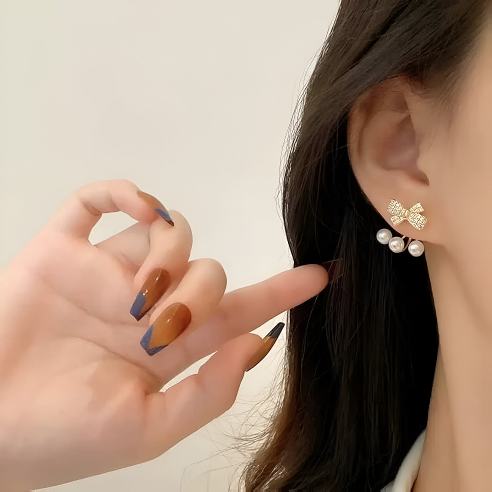 Elys Gold Plated Luxury bow Earrings