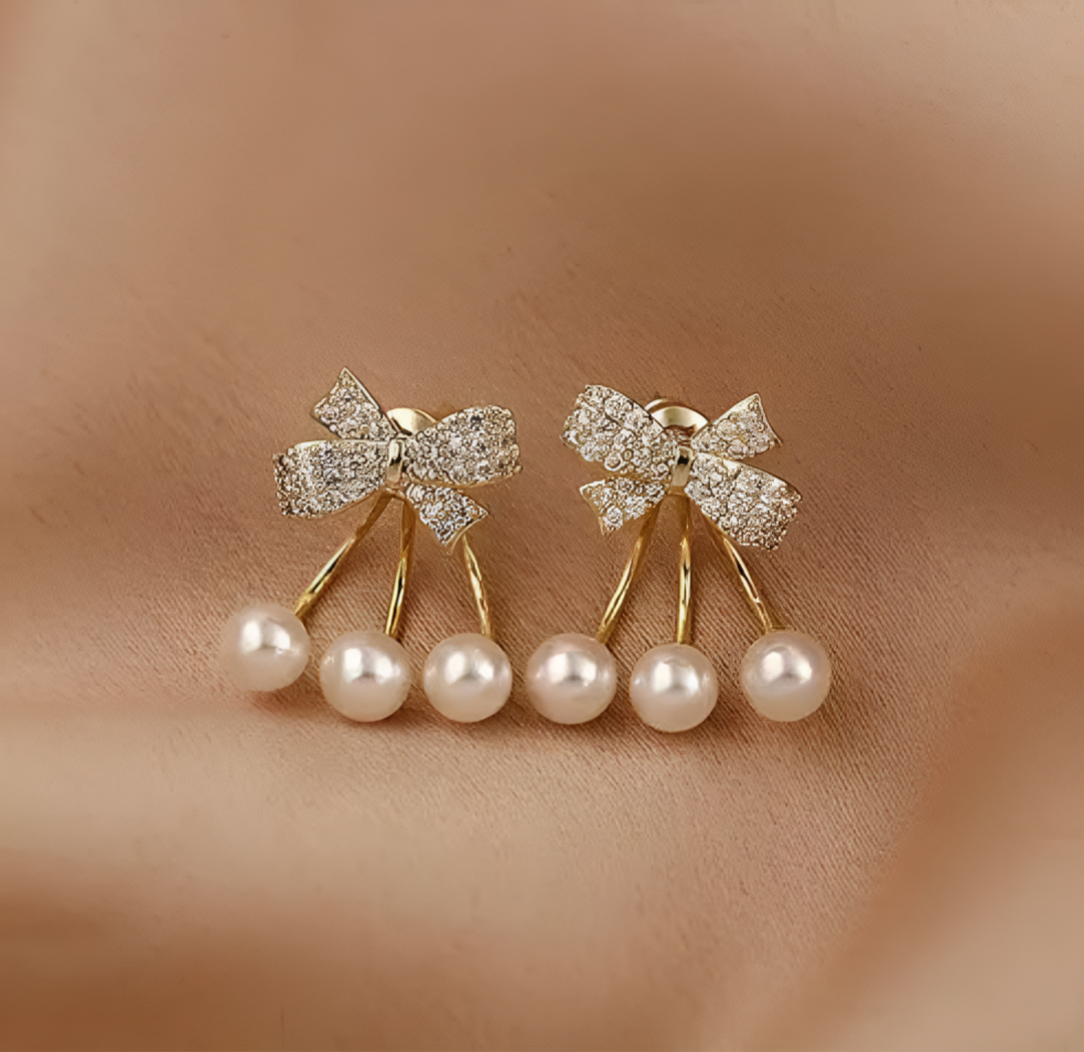 Elys Gold Plated Luxury bow Earrings