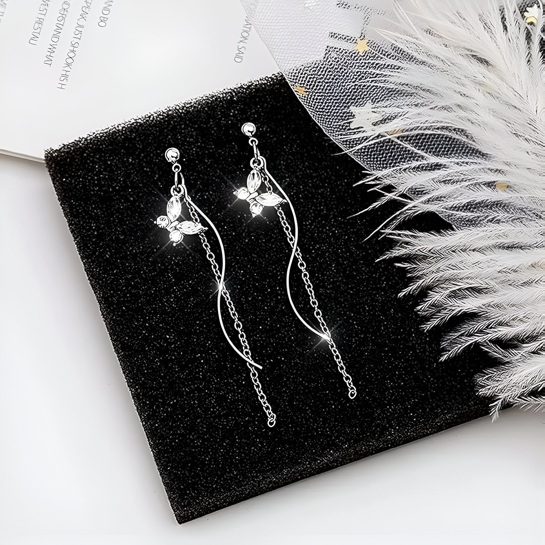 Elys Zircon Eye Tassel Earrings